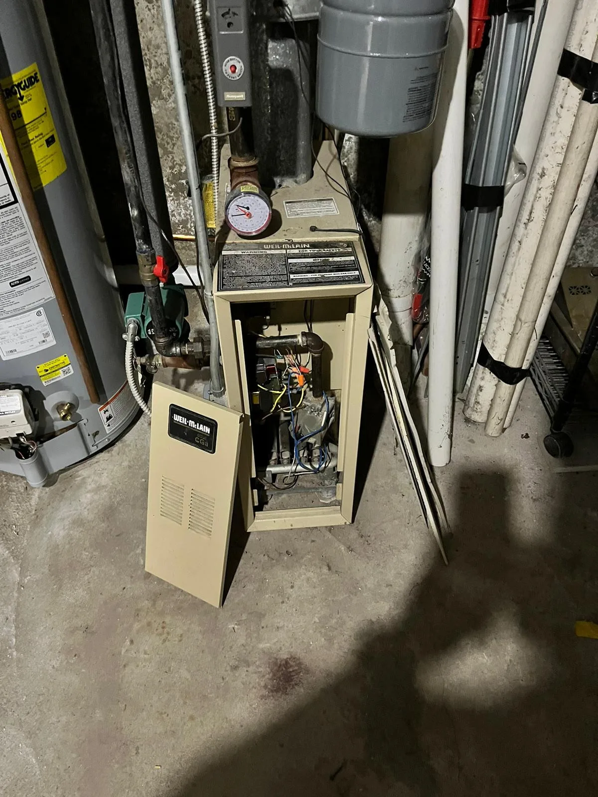 Boiler control cabinet opened for an annual maintenance inspection